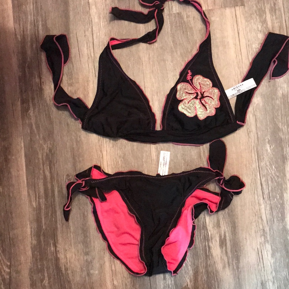 Black and pink flowered, ruffled bathing suit